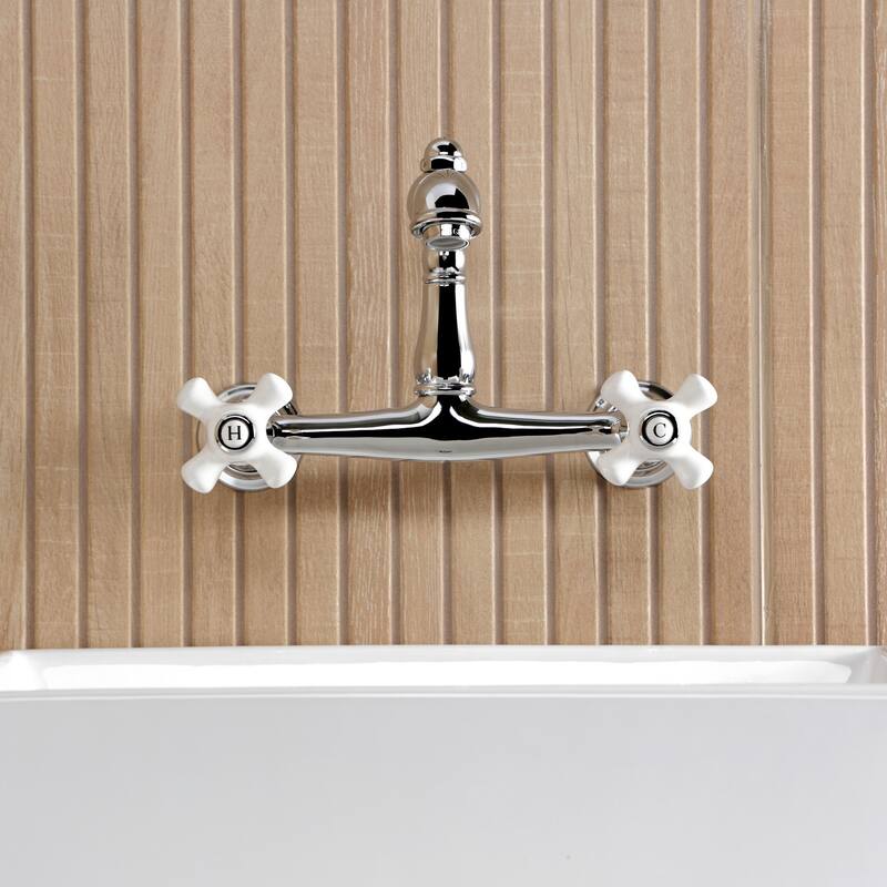 Kingston Brass English Country Two-Handle 2-Hole Wall Mount Bathroom Faucet