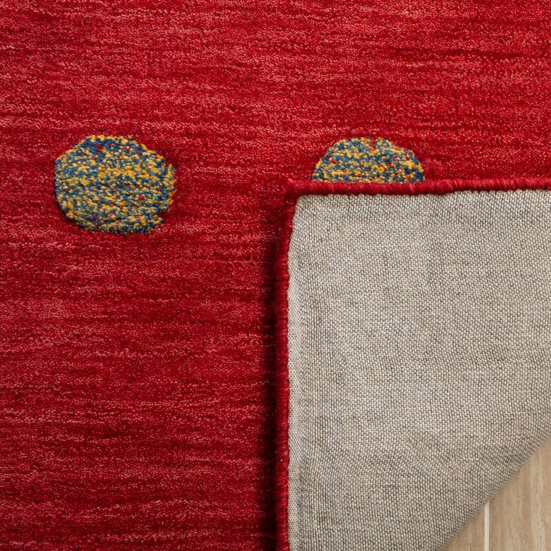 SAFAVIEH Handmade Himalaya Brittni Modern Wool Rug