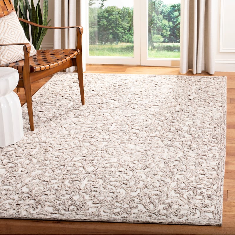 SAFAVIEH Handmade Trace Megane Modern Wool Rug - 2'3" x 4' - Brown/Ivory