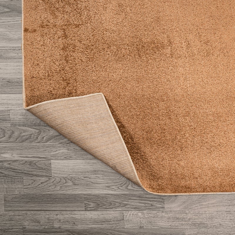 JONATHAN Y Fawning Classic Solid Low-Pile Machine-Washable Terra Area Rug