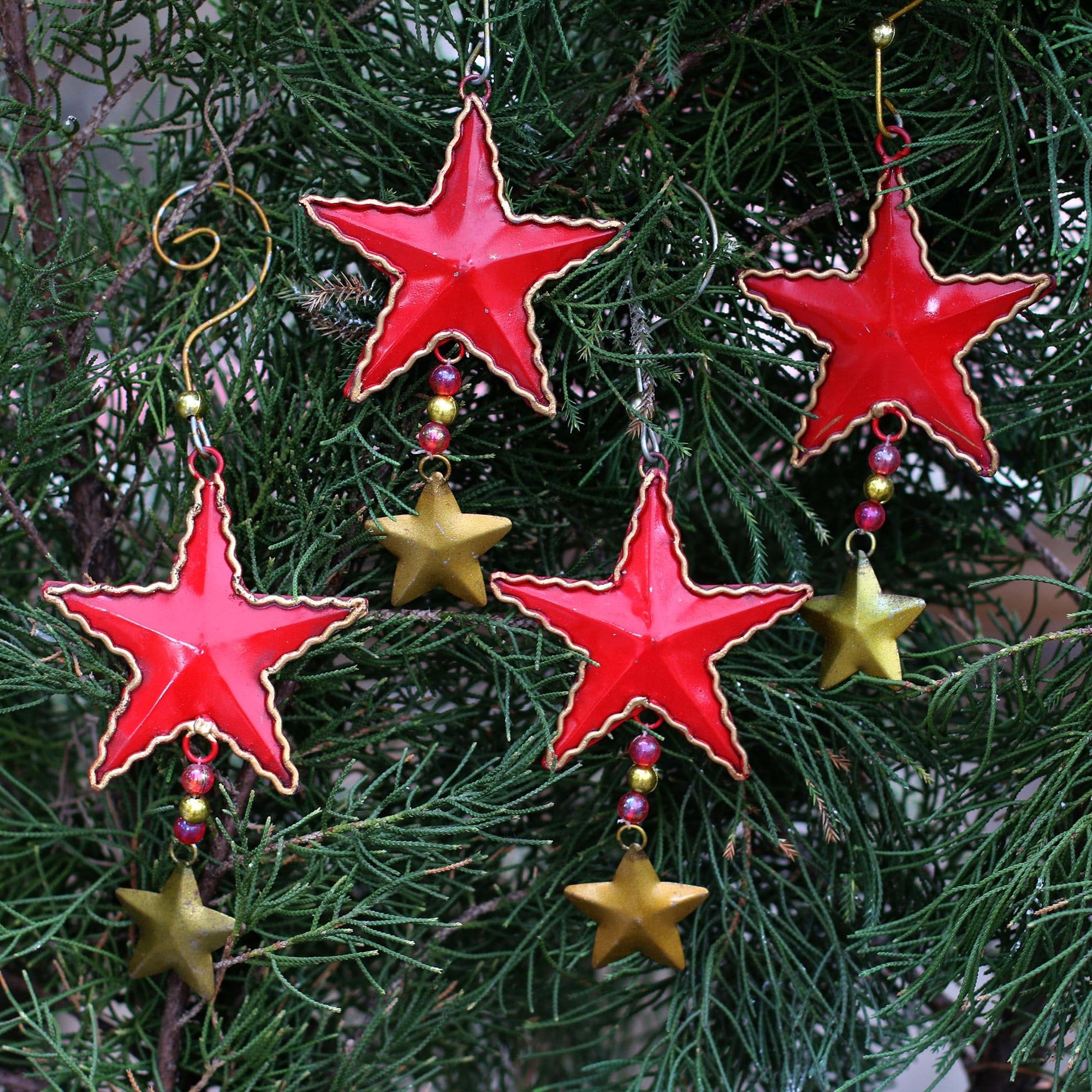 Novica Handmade Passionate Stars Steel Ornaments (Set Of 4)