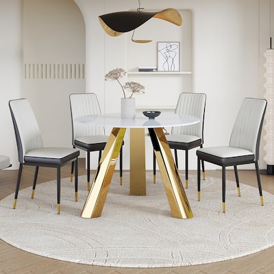 A 42-Inch Round Dining Table With Cast Iron Base And Stainless Steel Legs, Paired With Four White-Gray Striped Dining Chairs