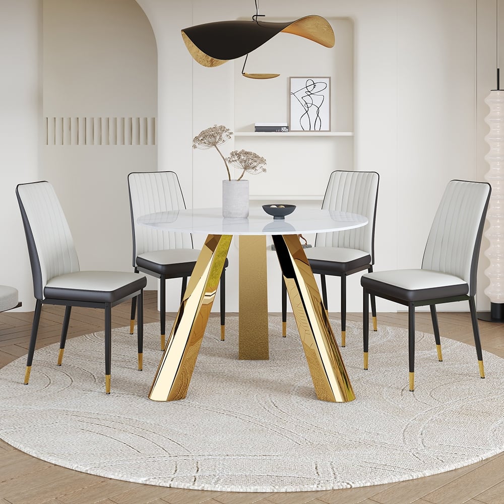 A 42-inch round dining table with cast iron base and stainless steel legs, paired with four white-gray striped dining ch