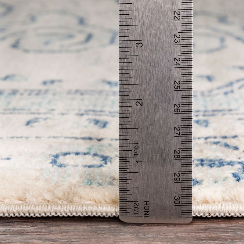 Livabliss Lleucu Distressed Persian Area Rug