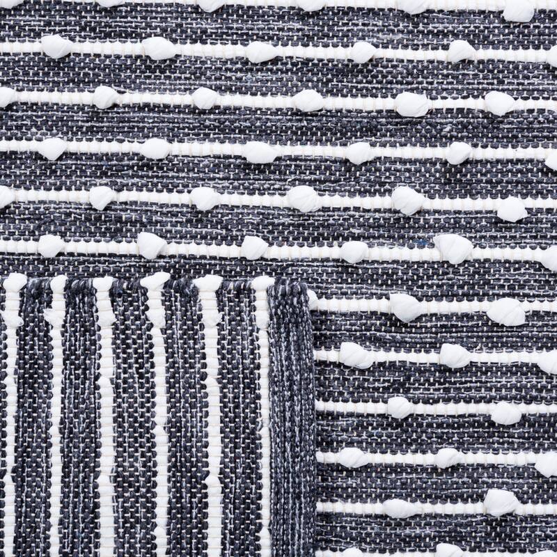 SAFAVIEH Handmade Montauk Millie Casual Rug