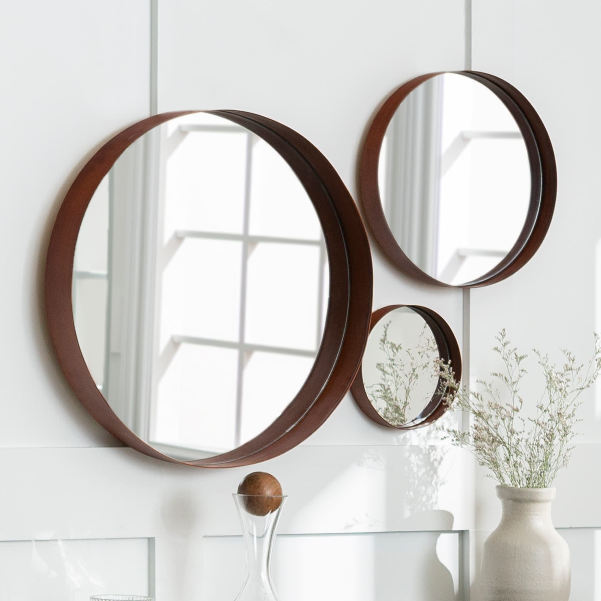 Middlebrook Designs Round Copper Banded Wall Mirrors Set Of 3 Overstock 17433994 Modern wall mirrors dazzle in the living room, bedroom and entryway. middlebrook designs round copper banded wall mirrors set of 3