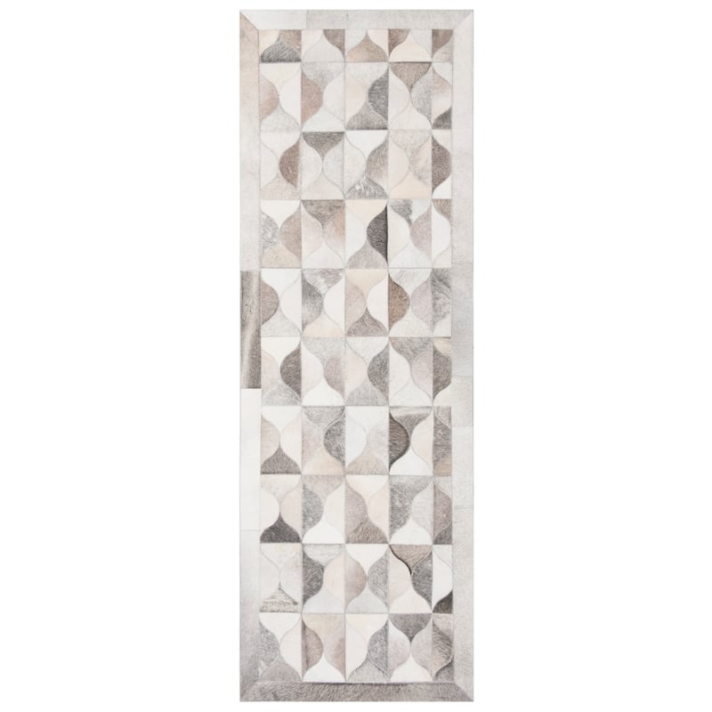 SAFAVIEH Handmade Studio Leather Takisha Modern Leather Rug