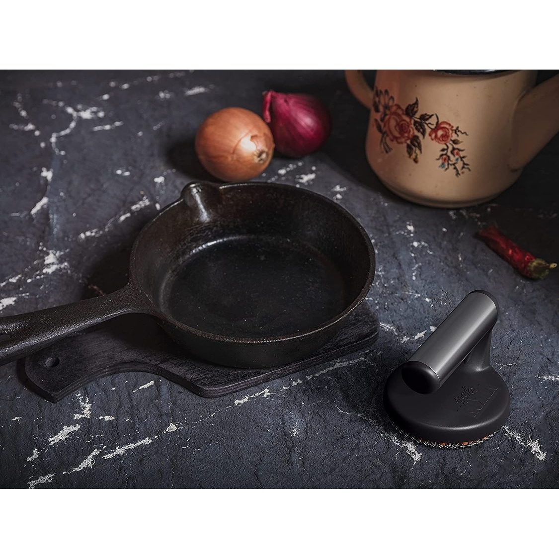 https://ak1.ostkcdn.com/images/products/is/images/direct/ed7173d15d5cbaf78cc5b939ed5984cb4c7c2d5d/Yukon-Glory-Cast-Iron-Skillet-Cleaner-The-Cast-Iron-Scrubber-and-Grill-Brush-Perfect-for-Cleaning-Cast-Iron-Cookware.jpg
