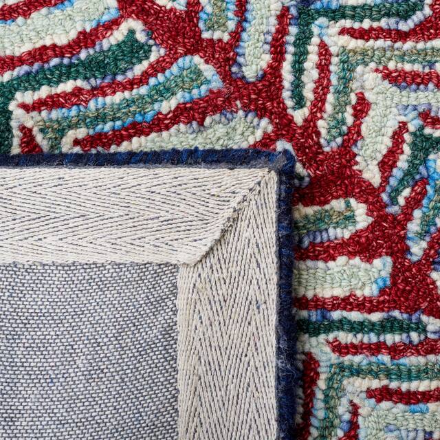 SAFAVIEH Handmade Capri Ilianka Wool Rug