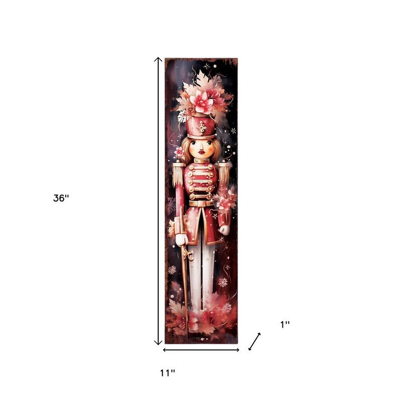 HomeRoots 36" Blue White And Red Christmas Nutcracker Solid Wood Porch Sign