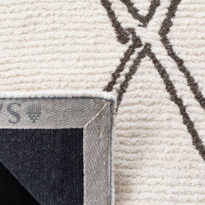 SAFAVIEH Handmade Casablanca Shag Charlyne Tribal Wool Rug