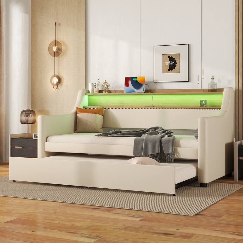 Versatile Twin Size PU Leather Upholstered Daybed with Trundle Open Shelf, Charging Station and LED Lights
