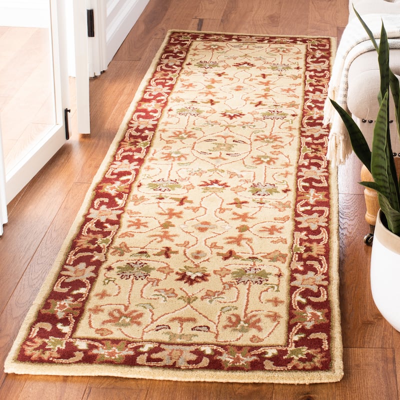 SAFAVIEH Handmade Heritage Rosamond Traditional Oriental Wool Rug - 2'3" x 8' Runner - Ivory/Red