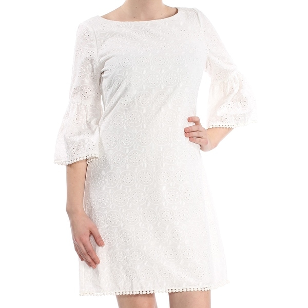 white eyelet dress with bell sleeves
