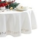 preview thumbnail 9 of 8, Poinsettia Noel Laser Cut Tablecloth 70" Round - Ivory