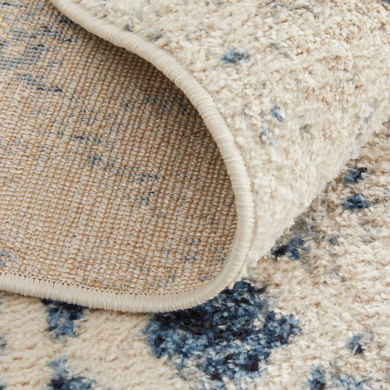 Wyllah Contrasting Distressed Area Rug