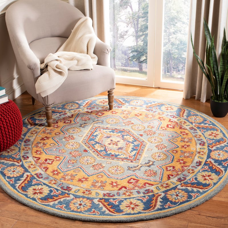 SAFAVIEH Handmade Antiquity Olgerta Traditional Oriental Wool Rug - 6' Round - Blue/Gold