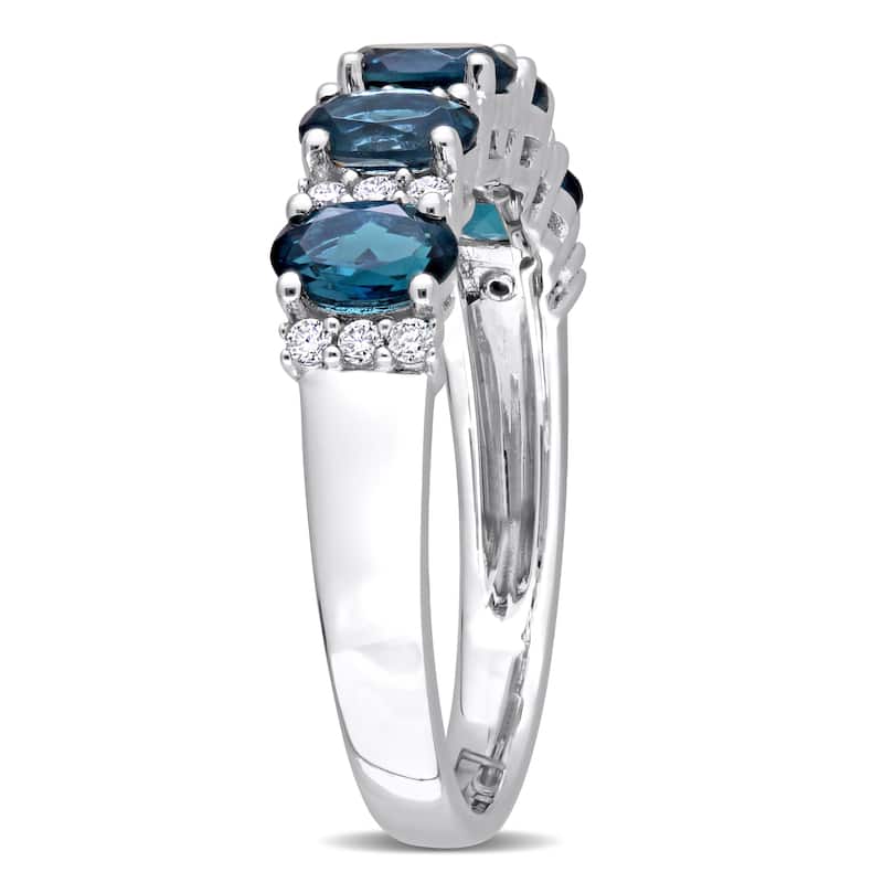 Miadora London Blue Topaz and 1/6ct TDW Diamond Semi-Eternity Ring in 14k White Gold