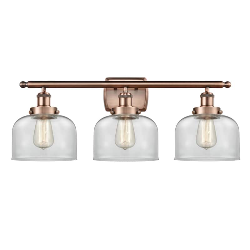 Innovations Lighting 916-3W-13-28 Bell Vanity Bell 3 Light 28" Wide - Antique Copper / Clear