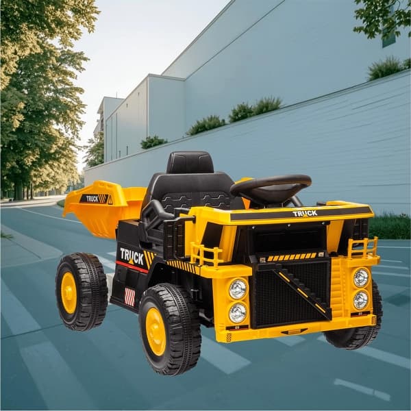 slide 2 of 10, Kids 12V Electric Ride On Dump Truck with Lifting Bed, Shovel, Spring Suspension, and LED Headlights for Boys Girls Ages 3-5 Yellow