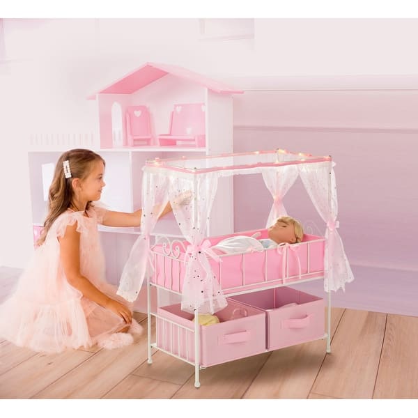 slide 2 of 7, Badger Basket Starlights Metal Doll Crib with Canopy, Bedding, Storage and LED Lights - Pink/White/Stars