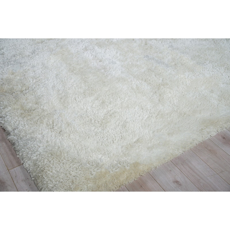 EXQUISITE RUGS Sumo Shag Hand-loomed Polyester/Microfiber White Area Rug.
