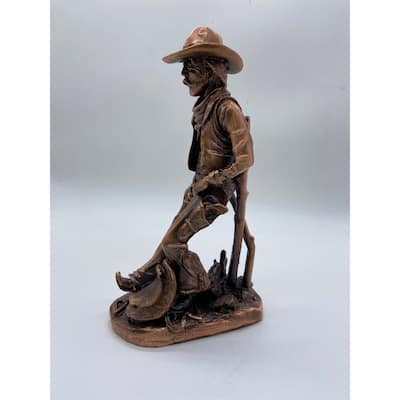 Cowboy with Saddle