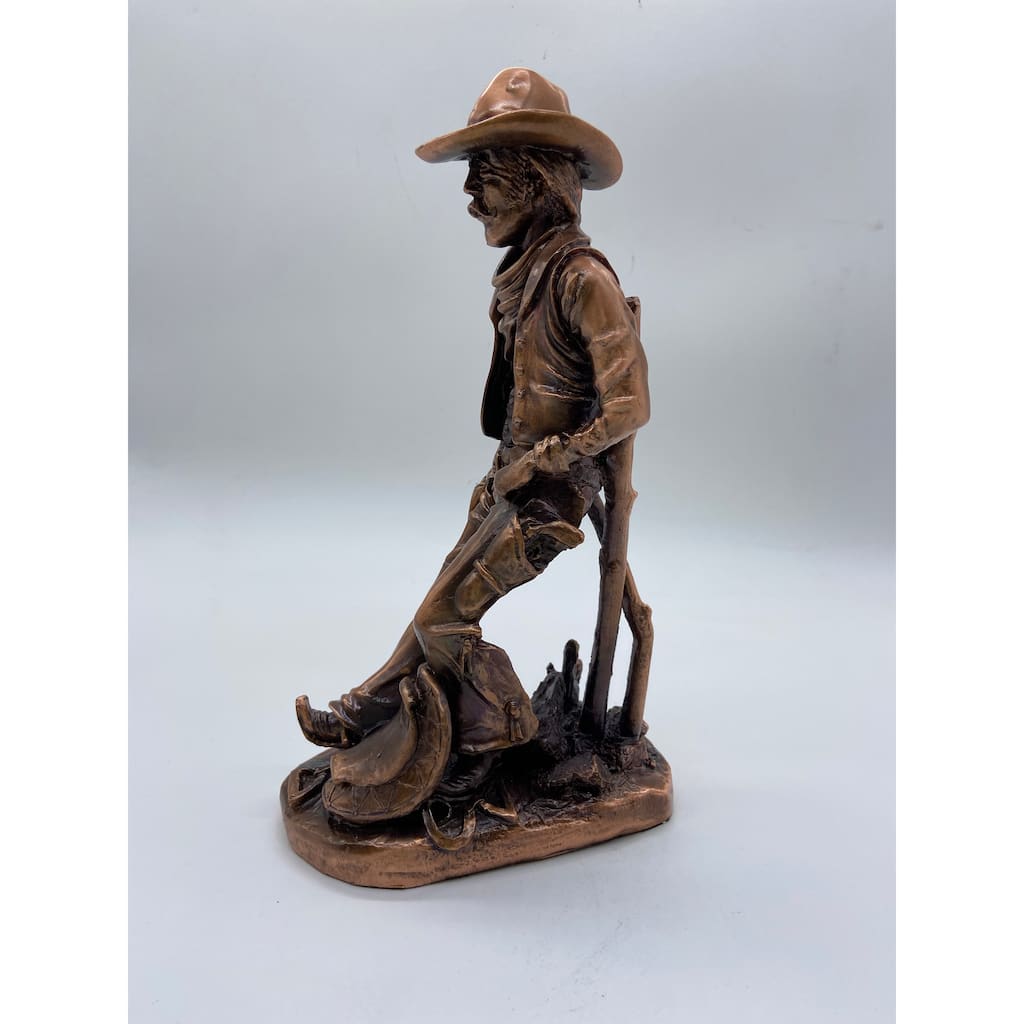 Cowboy with Saddle