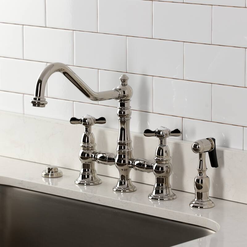 Kingston Brass Essex Two-Handle 4-Hole Deck Mount Bridge Kitchen Faucet with Brass Side Sprayer