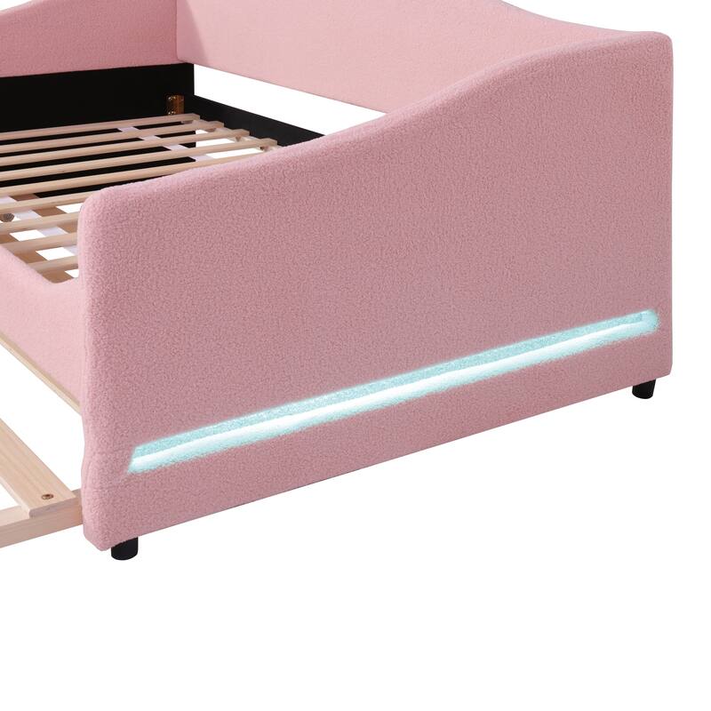Pink Twin Size Upholstered Daybed with Light Stripe Design and Trundle