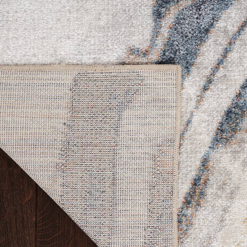 Nourison Astra Machine Washable Indoor only Abstract Area Rug - Ivory/Blue - 5' 3" x 7'