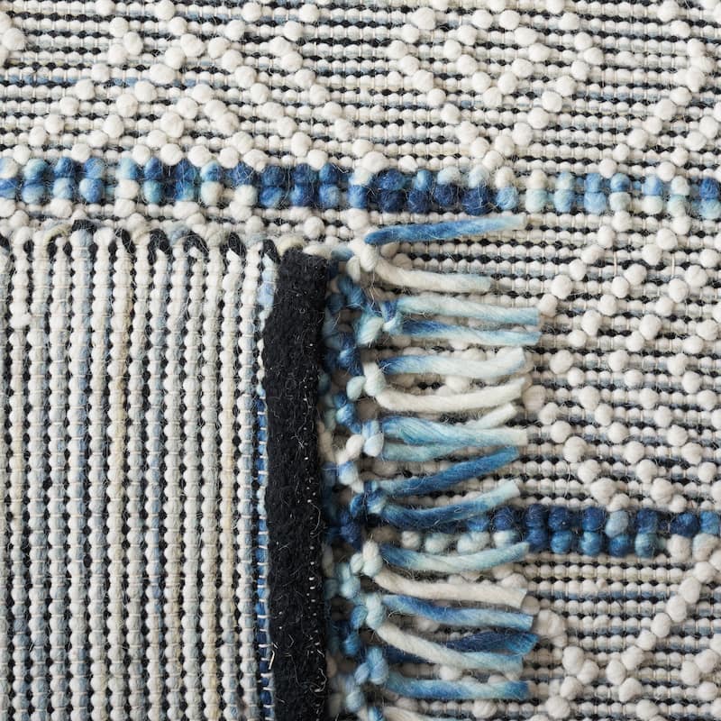 SAFAVIEH Handmade Natura Habibe Boho Fringe Wool Rug