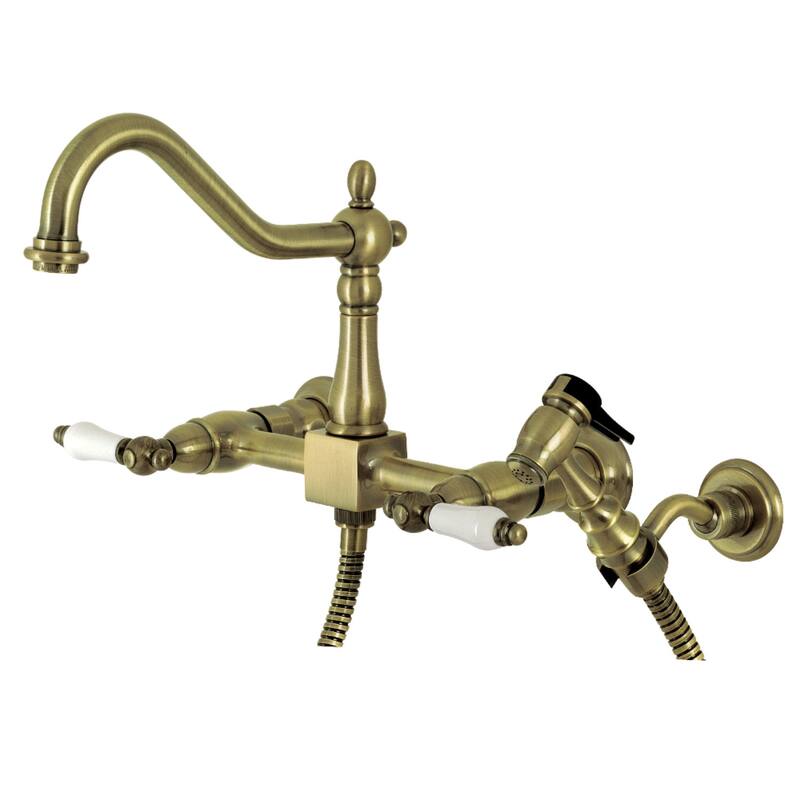 Kingston Brass Heritage Wall Mount Bridge Kitchen Faucet with Brass Sprayer - Antique Brass