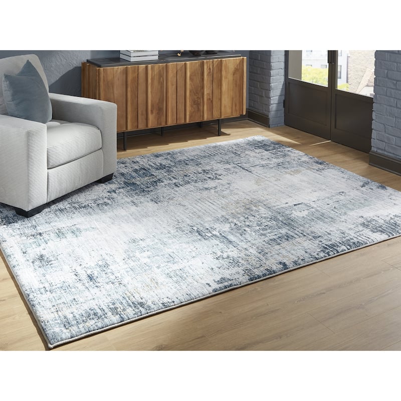 Signature Design by Ashley Arlenmont Blue/White/Brown Memory Foam Area Rug - 7'7"W x 9'6"D