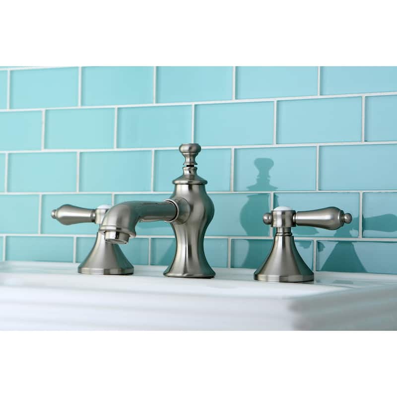 Kingston Brass Heirloom Deck Mount Widespread Bathroom Faucet with Brass Pop-Up