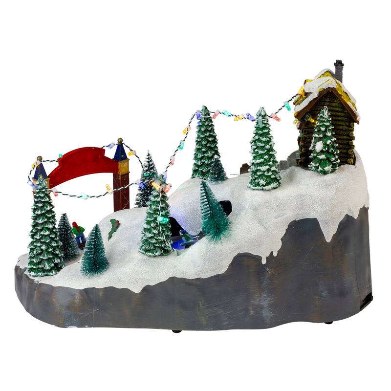 15" LED Lighted Winter Skiing Scene Animated Christmas Village Display