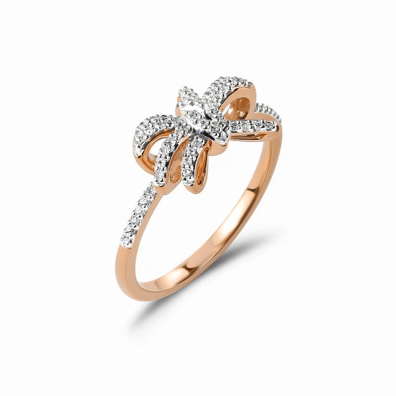 1/6ct TDW Diamond Knot Bow Fashion Ring in 10K Gold for Women