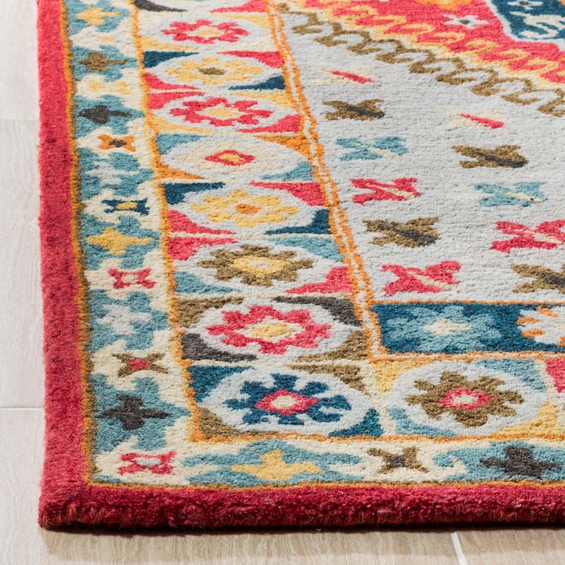 SAFAVIEH Handmade Heritage Striped Border Traditional Oriental Wool Rug