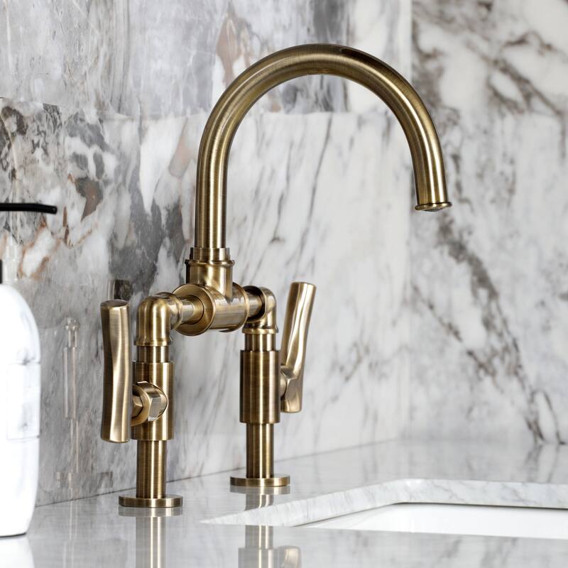 Kingston Brass Hallerbos Two-Handle 4-Hole Deck Mount Bridge Bathroom Faucet with Brass Pop-Up Drain
