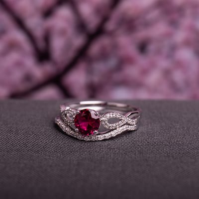 Miadora 10k White Gold Created Ruby and 1/6ct TDW Diamond Bridal Ring Set