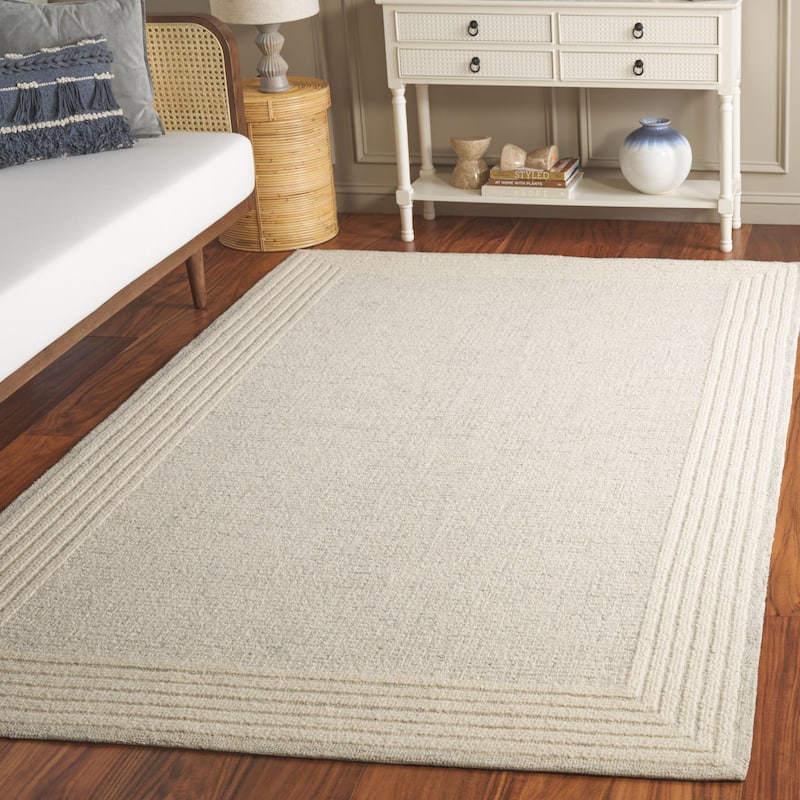 SAFAVIEH Handmade Ebony Dorith Border Wool Rug