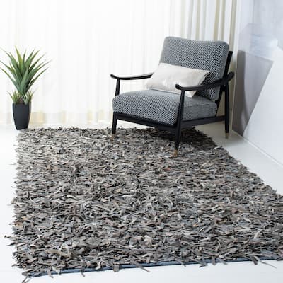 SAFAVIEH Handmade Leather Shag Alois Modern Rug