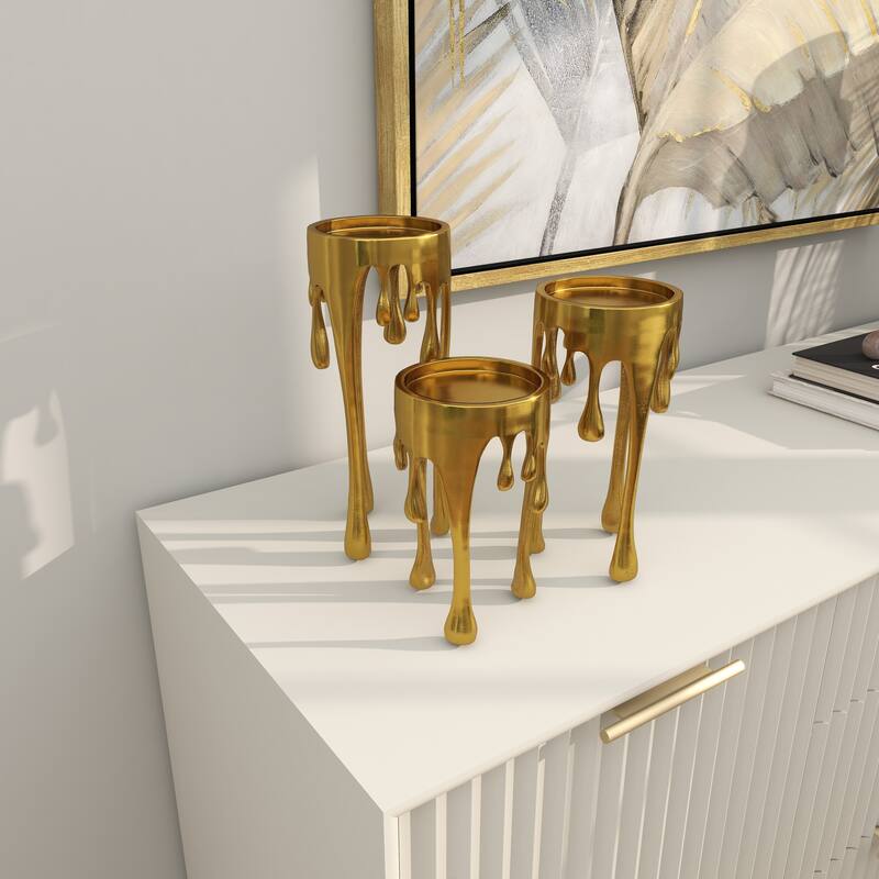 CosmoLiving by Cosmopolitan Silver, Gold or Black Aluminum Abstract Pillar Drip Candle Holder (Set of 3)