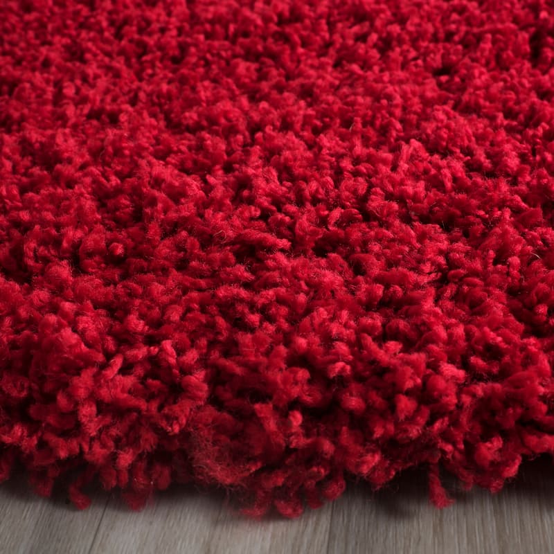 SAFAVIEH Laguna Shag Verdiana Solid Color 2-inch Thick Rug.