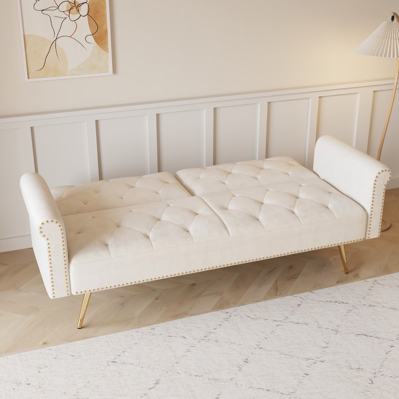 A 69.7-Inch-Long Sofa Bed Covered In Velvet Fabric, Featuring Nail Head Trim And Accompanied By A Matching Throw Pillow