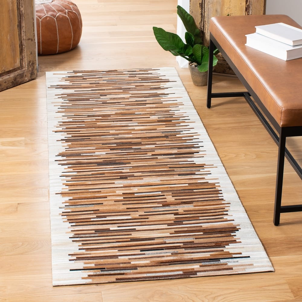 SAFAVIEH Handmade Studio Tobi Natural Hide Leather Rug