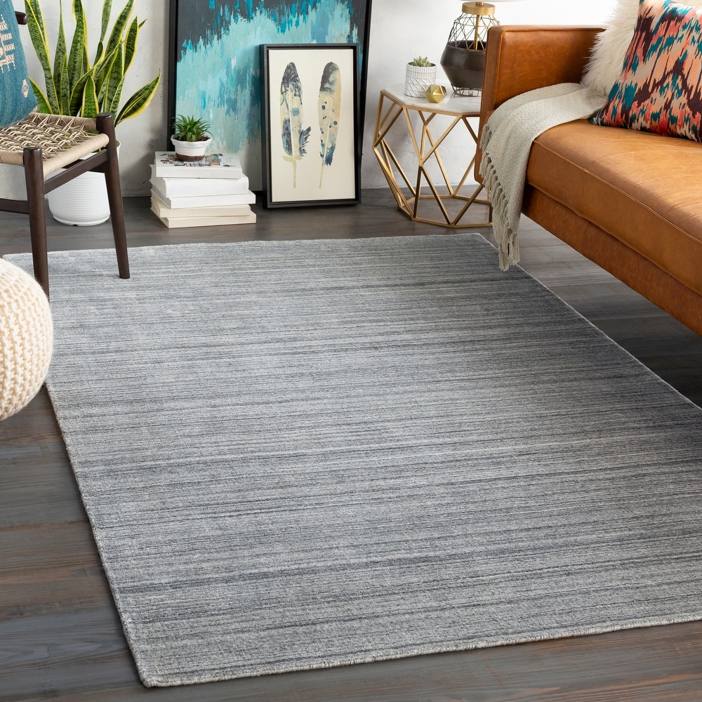 https://ak1.ostkcdn.com/images/products/is/images/direct/f075d0189fb2d58ea7dd74c7ac4d4b99baed8c0a/Belmont-Handmade-Heathered-Wool-Blend-Area-Rug.jpg