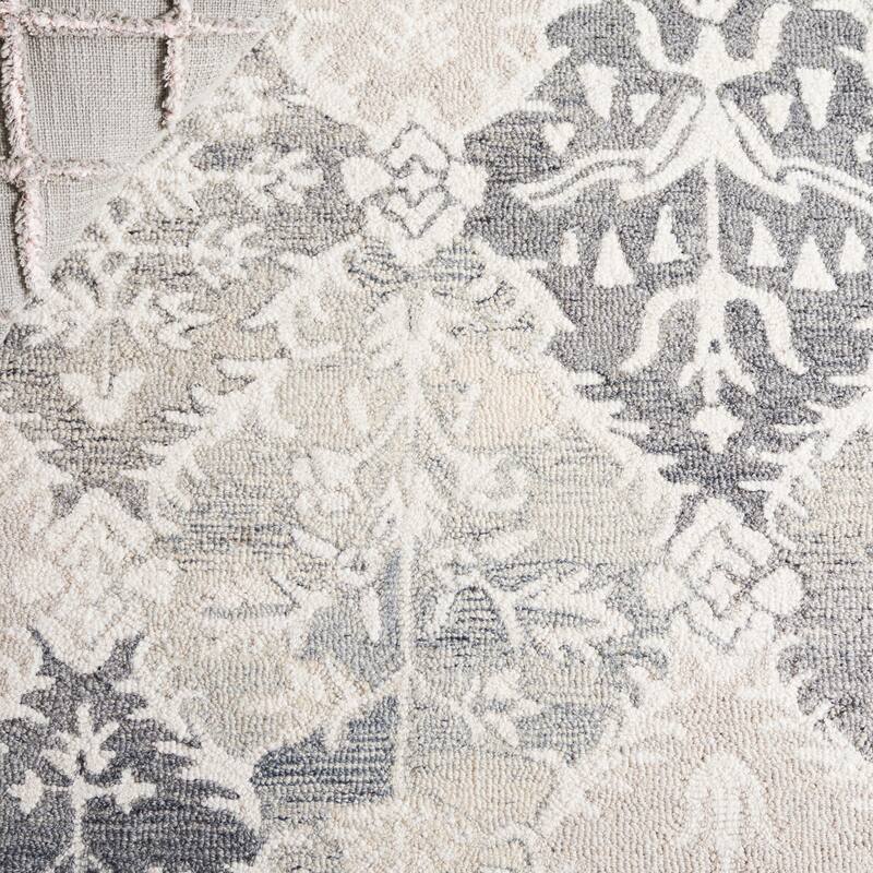SAFAVIEH Handmade Ebony Afifa Modern & Contemporary Wool Rug