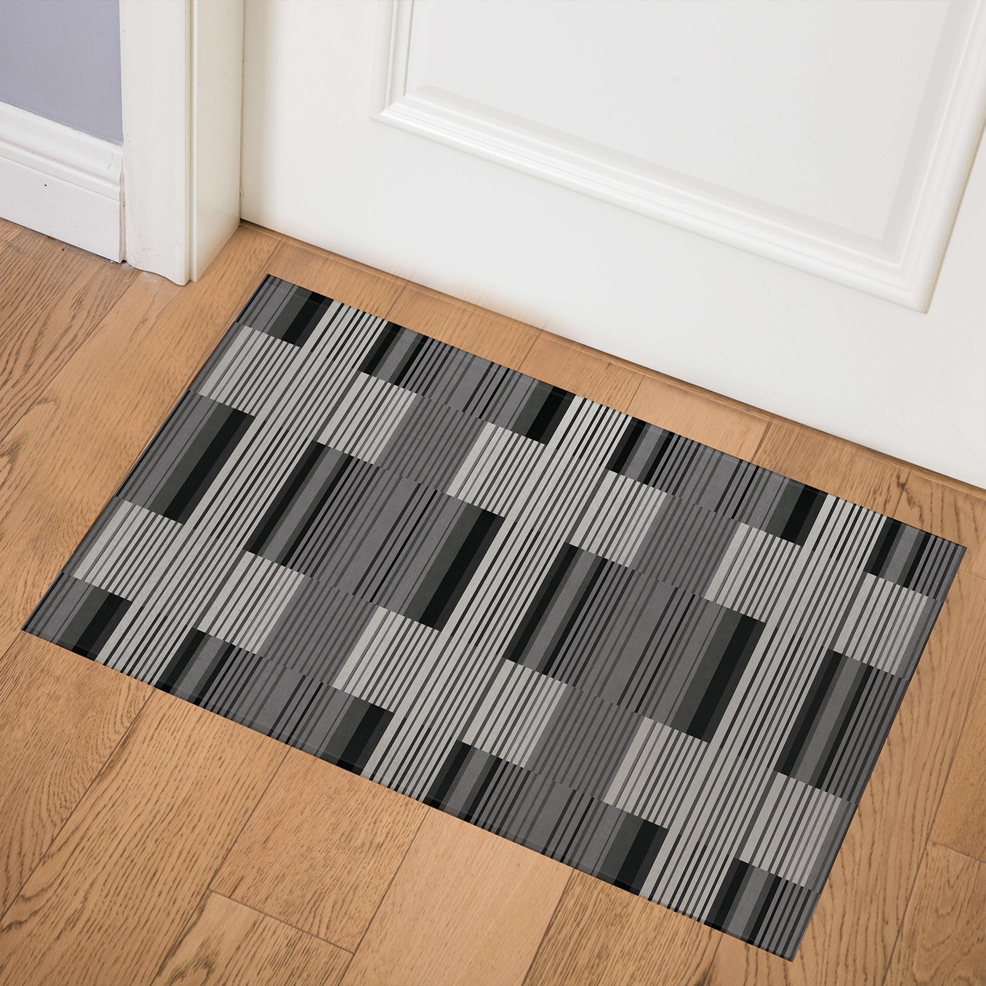 https://ak1.ostkcdn.com/images/products/is/images/direct/f0bba66224c3ca38ab55099d6847628dc263740a/BAUHAUS-STRIPE-GREY-Indoor-Floor-Mat-By-Kavka-Designs.jpg