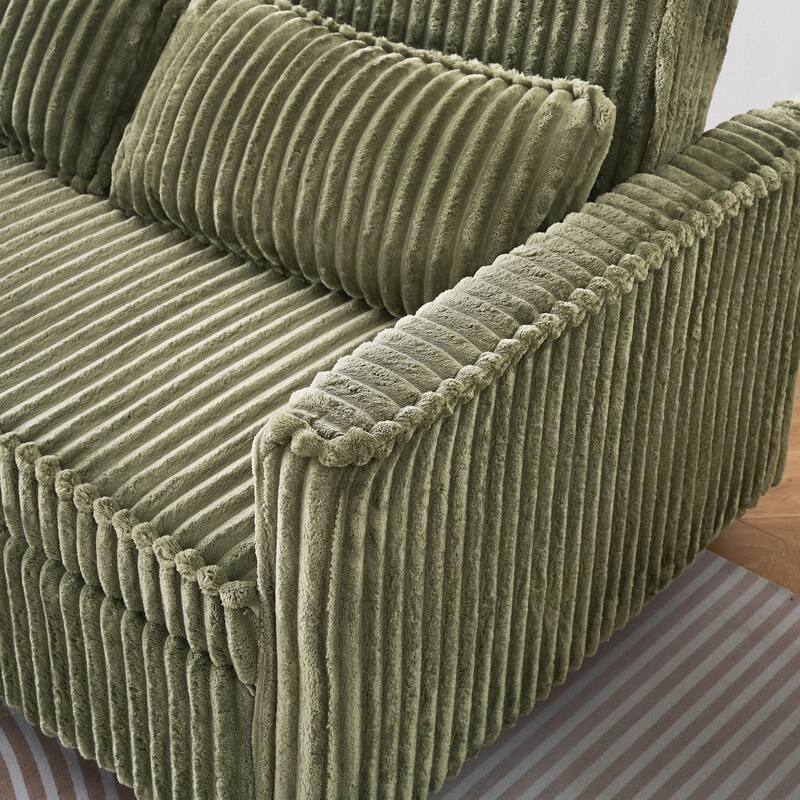 The pull-out and push-in green corduroy sofa with dual functions,equipped with a movable tabletop and USB ports